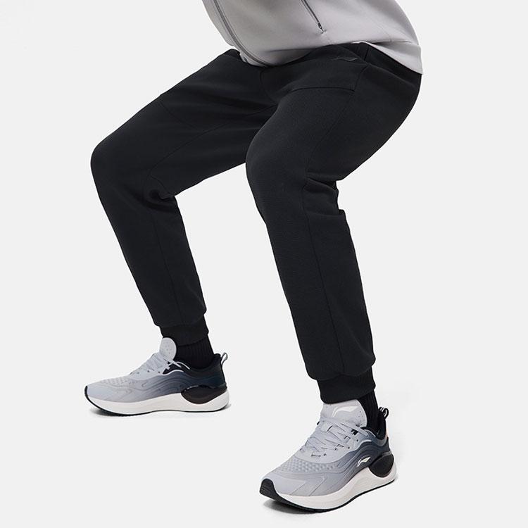 Мужские спортивные брюки Li Ning Fitness Series из плотного флиса с завязками на манжетах, черные AKLT743-1
