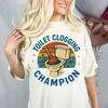 Funny Toilet Clogging Champion T-Shirt for Plumber Gift Retro Bathroom Humor Tee Gag Gift Idea for Men Women Shirt