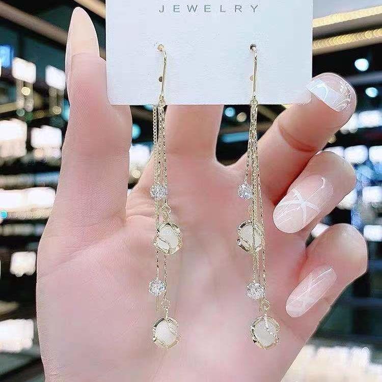 Cat's Eye Tassel Ear Chain 2024 Trend: Elegant Long Earrings with Light Luxury Design