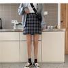 Юбка А-силуэта с высокой талией в клетку для женщин — тренд осени/зимы 2023 года