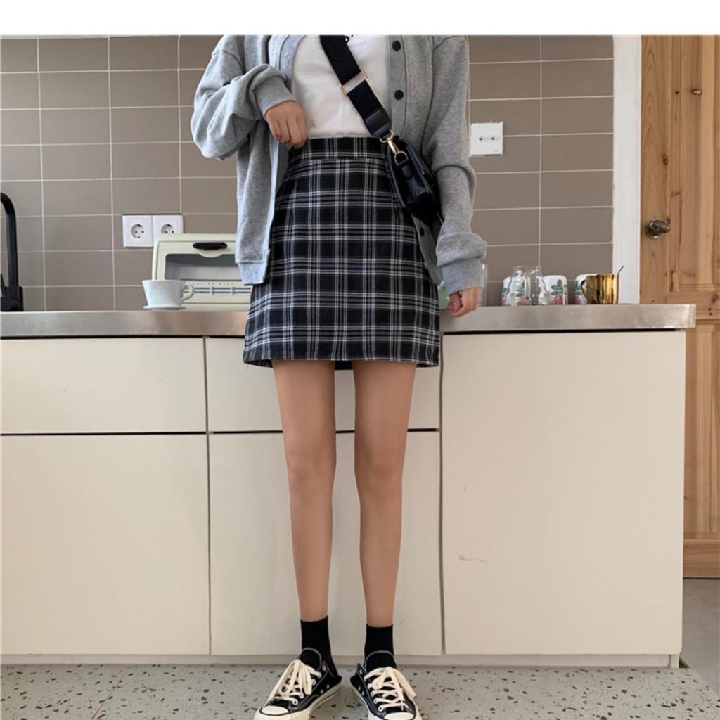 Юбка А-силуэта с высокой талией в клетку для женщин — тренд осени/зимы 2023 года
