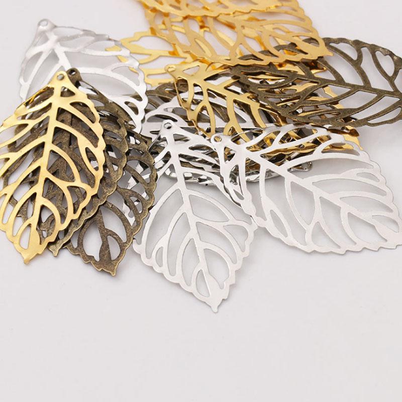 Товары для домашней вечеринки Изготовление ювелирных изделий Винтаж Ретро с покрытием DIY Золотой Шарм Филигрань 50 шт. Ювелирные аксессуары Полые листья Подвеска Ремесло