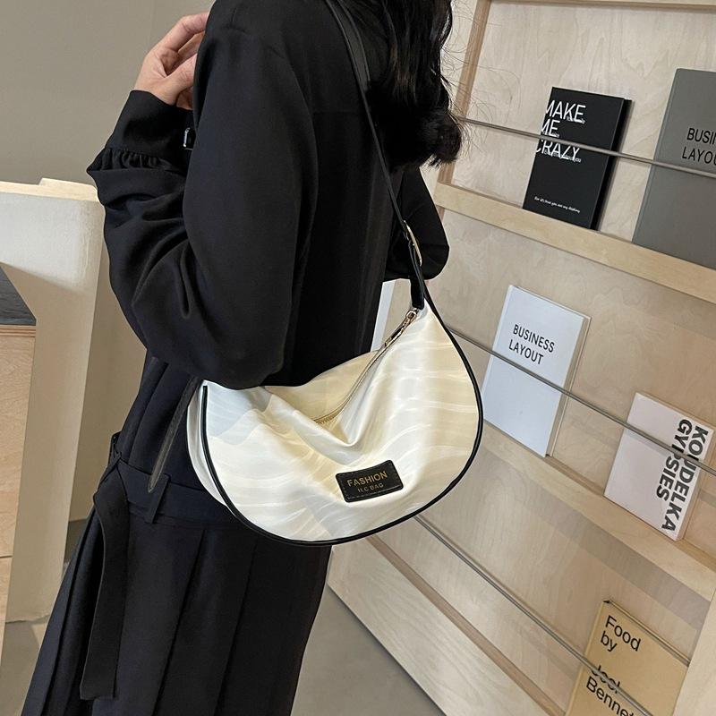 Городская текстура Нишевая сумка Женская сумка Новая повседневная сумка через плечо Модная простая сумка-пельмень на одно плечо Трендовая