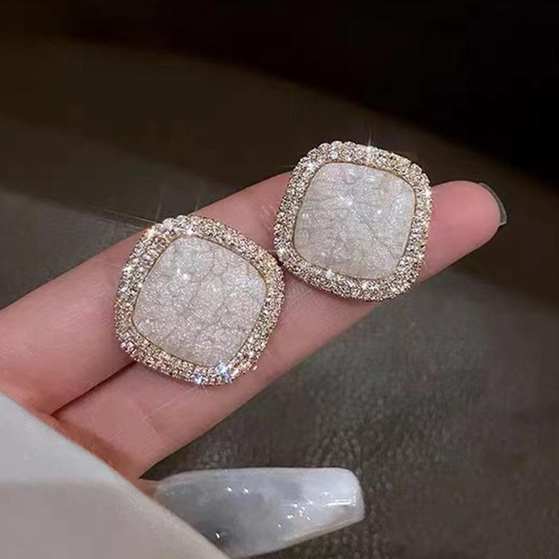 Серебряные серьги-кисточки с жемчугом и иглами - модные универсальные женские украшения