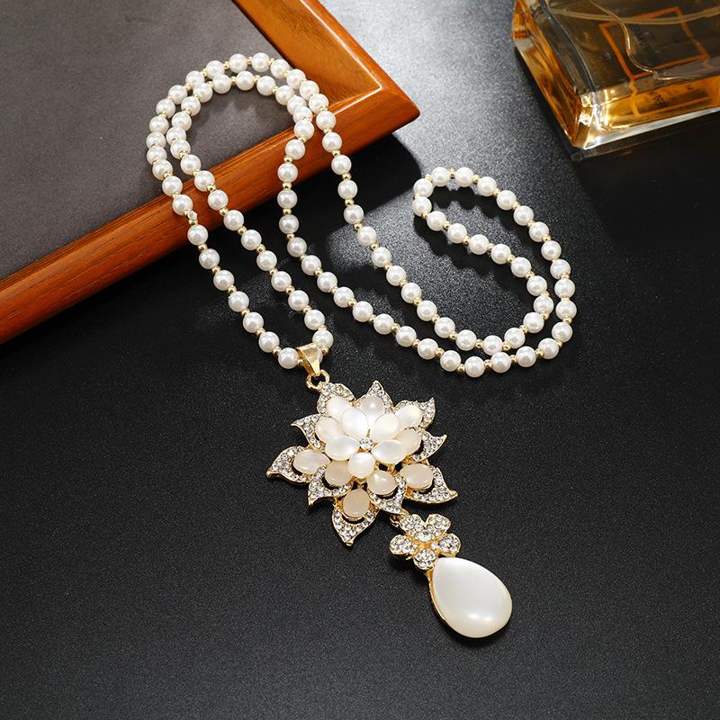 Длинное и изысканное колье, хрустальный кулон, цепочка для свитера, высококачественное и универсальное колье, простые и высококачественные аксессуары для цепочки для свитера.