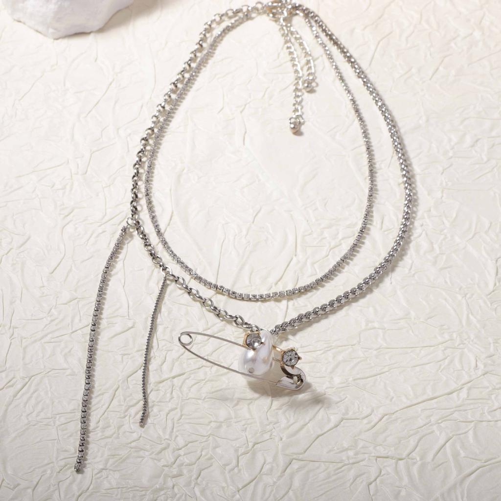 Creative design sense asymmetrical splicing chain inlaid zircon imitation pearl unique pin pendant women's necklace