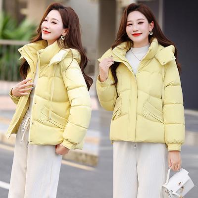 Женская короткая ветрозащитная теплая зимняя куртка с капюшоном и регулируемым подолом