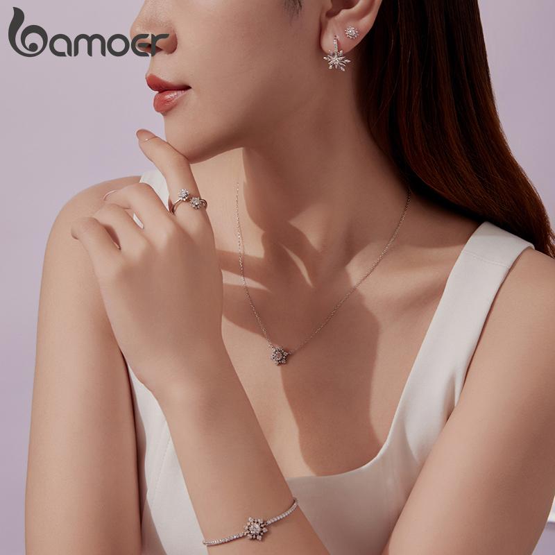 BAMOER 925 Sterling Silver Shining Ice Flower Stud Earrings Paved CZ Snowflakes Halo Earrings for Women Sparkling Winter Gift