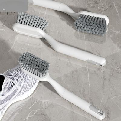 Легкая роскошная щетка для обуви — это бытовой инструмент для чистки и мытья обуви с длинной ручкой и мягкой щетиной.