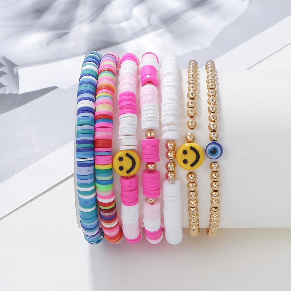 European and American simple multi-layer elastic line flat bead smiley face women's bracelet set, retro bohemian bead jewelry