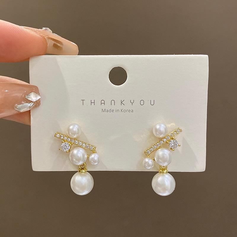 Silver needle micro-inlaid zircon pearl earrings women's light luxury high-end sense niche unique earrings Japanese and Korean style ear jewelry