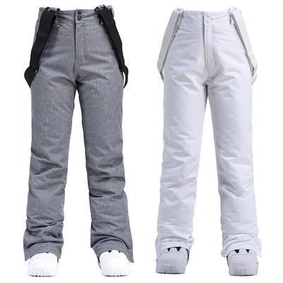Ветрозащитные водонепроницаемые лыжные брюки для мужчин и женщин со съемной резинкой на талии. Плотный теплый хлопок для комфортных зимних приключений.