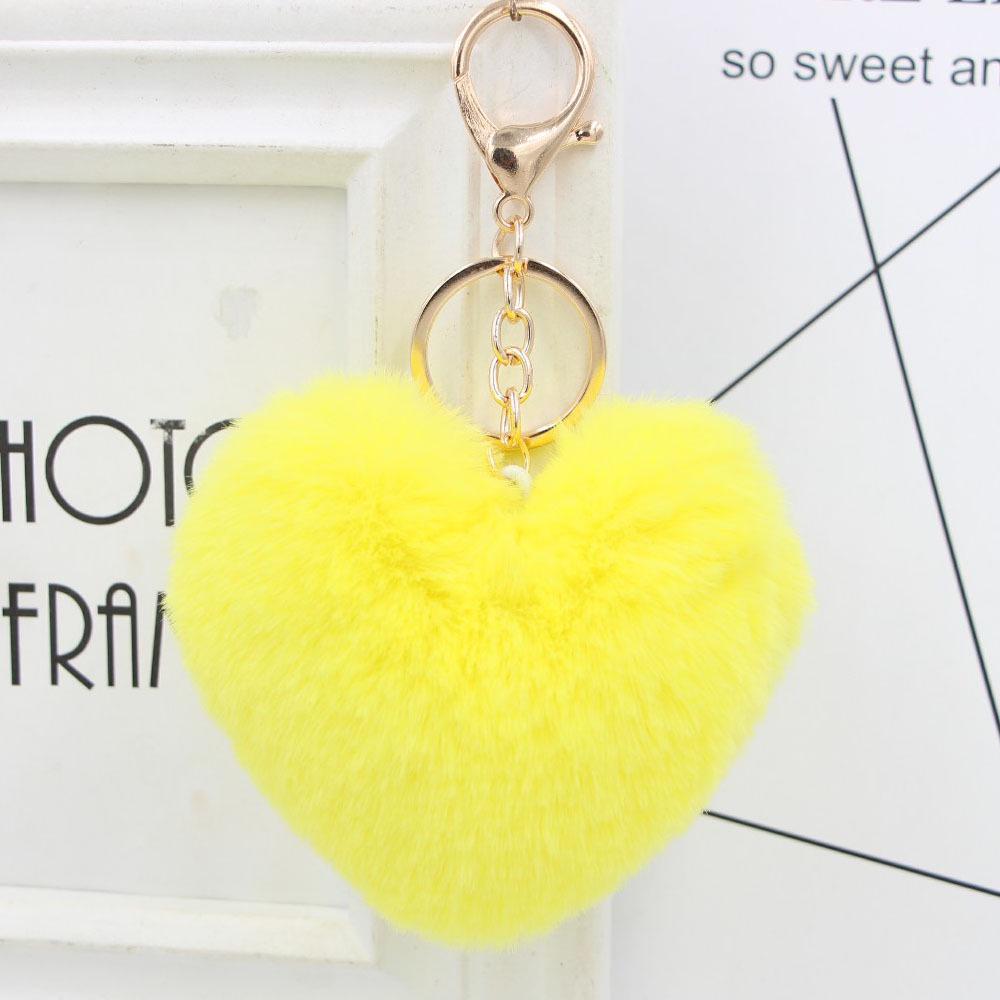 "Charming Heart-Shaped Rabbit Fur Keychain - Fashionable Fluffy Accessory for Ladies' Bags"