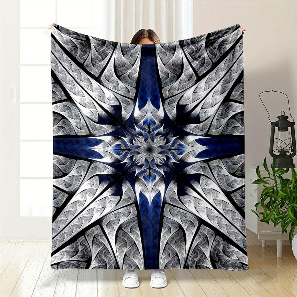 Intricate radial pattern resembling a metallic star with swirling details. for all seasons blanket lunch break throw gift