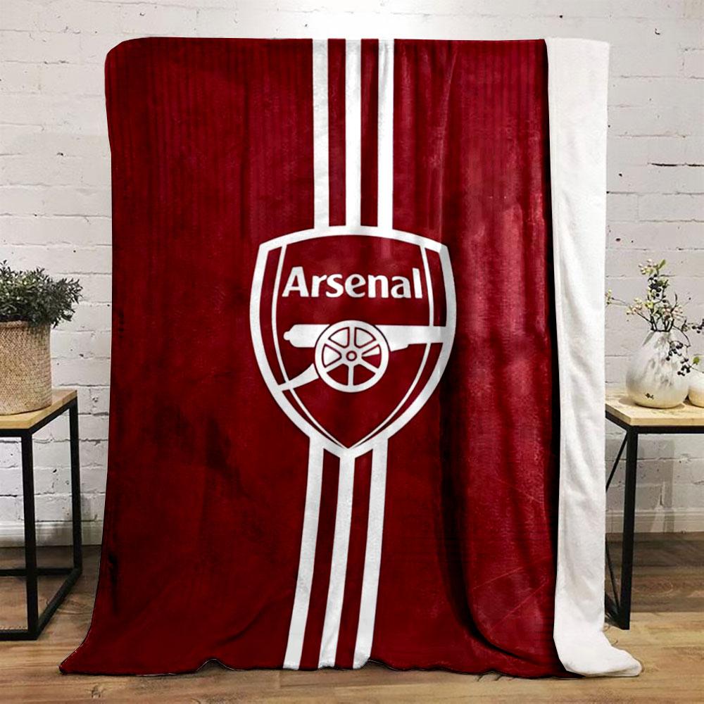 A red background with an Arsenal logo and vertical white stripes. for all seasons blanket lunch break throw gift