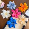 Photogenic Hibiscus Hair Clip: Vacation Style Frangipani Accessory for Women