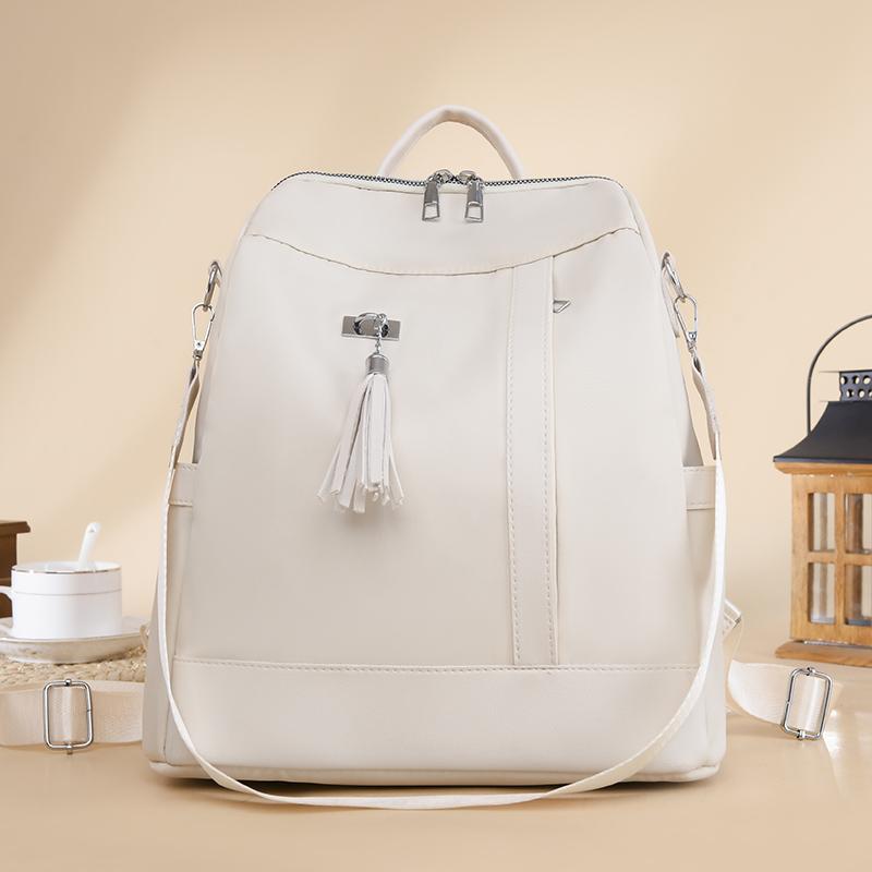 Новый большой вместительный простой стильный повседневный женский рюкзак Mochila для путешествий, дизайнерский рюкзак с кисточками, водонепроницаемая тканевая большая женская сумка на плечо