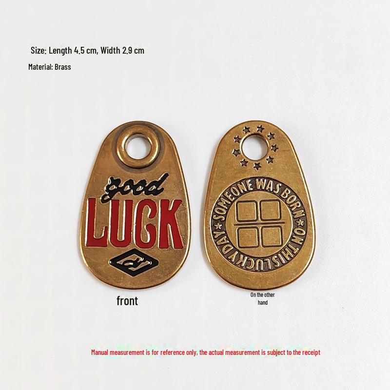 Подвеска-брелок Lucky Brass: Декоративный аксессуар в виде медной сумки-молнии «Удача».