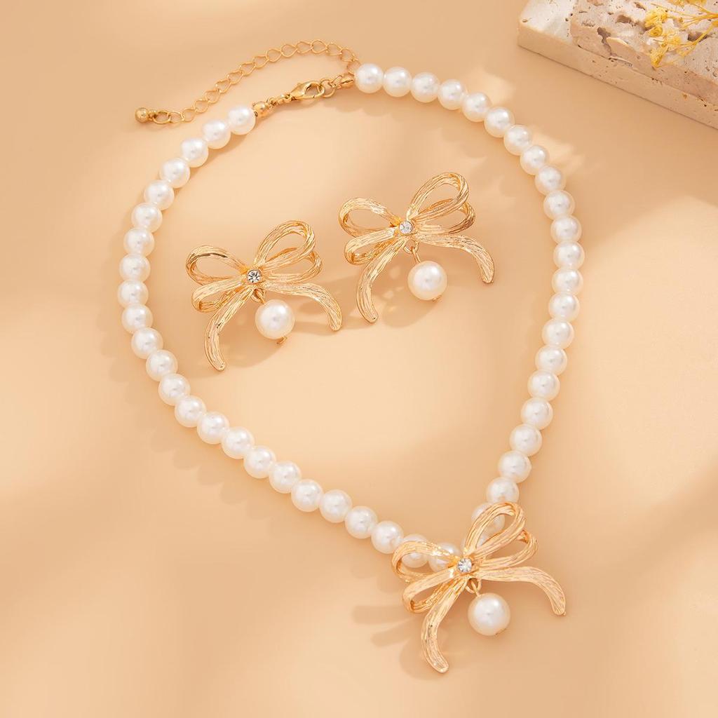 Элегантный комплект из европейского и американского искусственного жемчуга с подвеской в виде банта