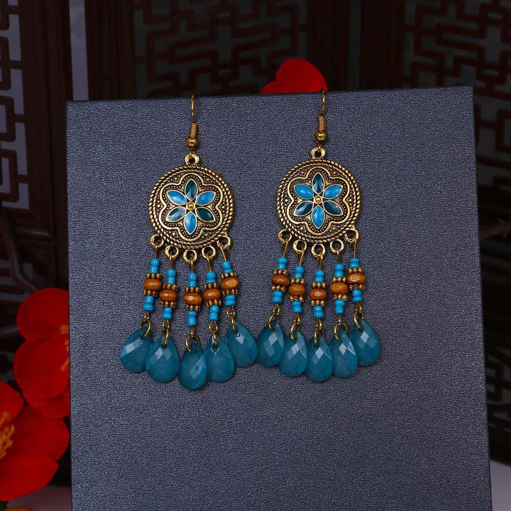 Серьги-кисточки с рисовыми бусинами и каплями воды в стиле бохо - этнический стиль, яркая индивидуальность