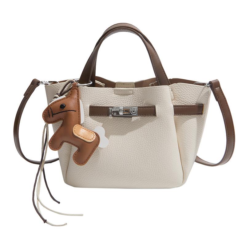 Soft leather new handheld women's bag 2026 casual lychee pattern vegetable basket bag textured versatile single-shoulder crossbody bag
