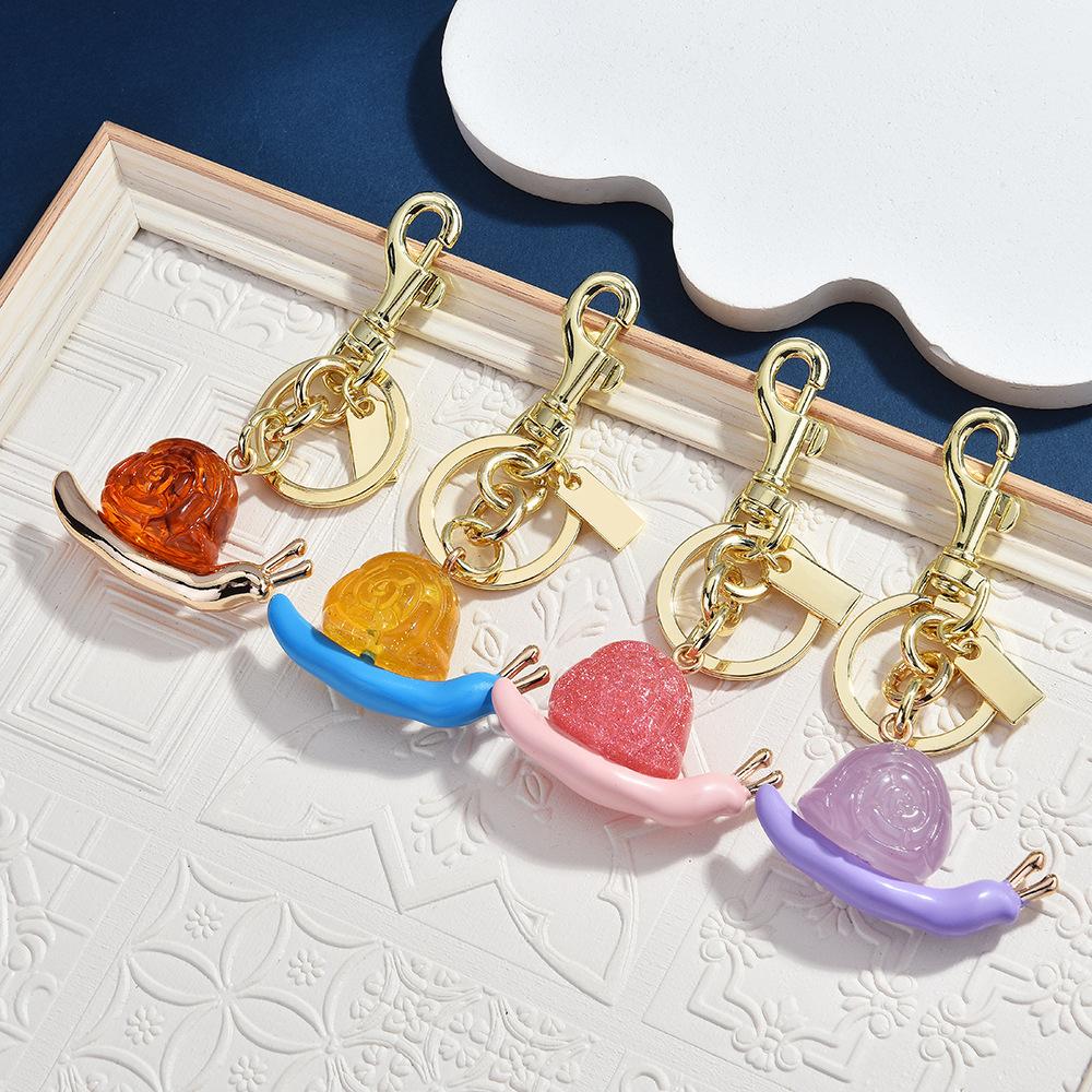 Retro Gold Oil Drop Snail Keychain Multi-Color Glitter Bag Pendant Light Luxury Niche Car Key Chain Versatile Pendant