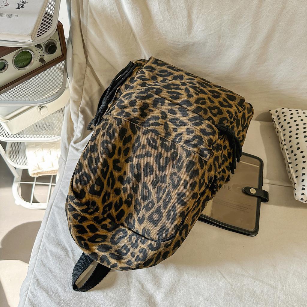 Рюкзак с леопардовым принтом Повседневный Модный уличный стиль Легкий рюкзак для женщин с деталью в виде кисточки для школы, путешествий и повседневных прогулок