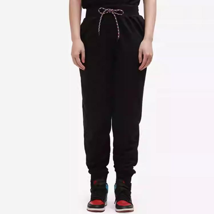 Puma Tapered Fit Knit Joggers With Patch Drawstring Women Bottoms Black 531355-01