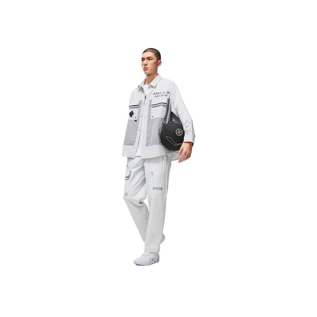 Мужские спортивные брюки с манжетами и завязками Li Ning X Cyril Artist Collaboration Wade Series с однотонным принтом и буквами, каменно-серые AYKT761-3