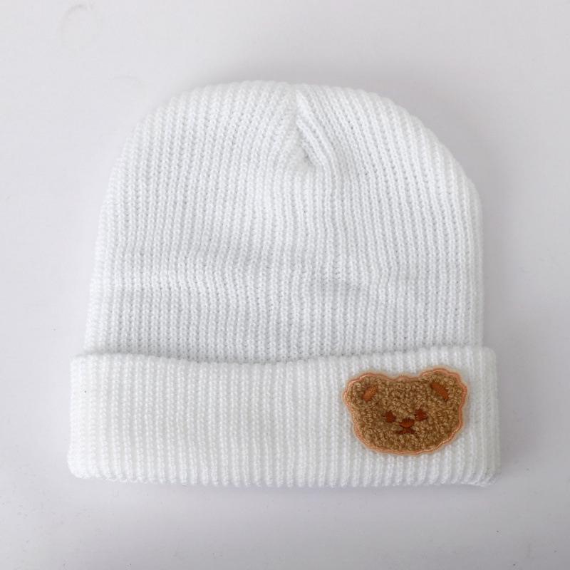Милая шапка из шерсти однотонного цвета с мишкой, женская новая осенне-зимняя теплая с защитой ушей, универсальная вязаная шапка, тренд