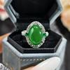 Highly translucent, bright green chalcedony ring  Luxurious diamond-encrusted ring with dense diamond inlays on both sides