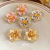 Holiday Wind Steel Needle Dripping Oil Flower Stud Earrings Female Sweet Temperament Earrings Light Luxury High-end Earrings Design Sense Niche