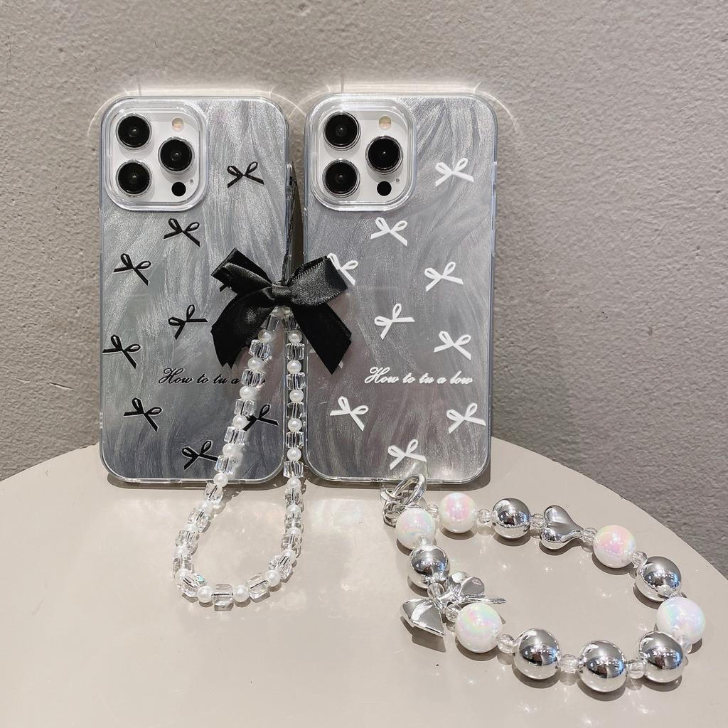 Suitable for Apple 15pro Bracelet Bow Protective Cover for IPhone 11 Laser 14 Feather Yarn Mobile Phone Case 16