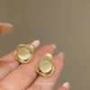 Square opal ear clips without holes, high-end light luxury zircon stud earrings, femininity retro painless mosquito coil disc earrings.