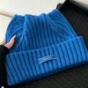 Korean order% wool vertical pattern cold hat women's big head circumference shows the face, cute cat ear hat multi-color knitted hat