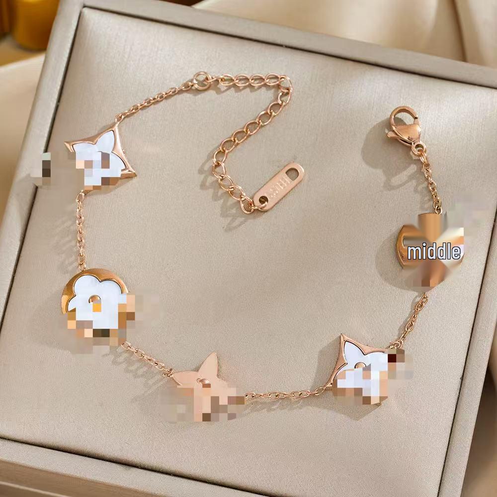 Браслет из титана с покрытием из 18-каратного золота 'Четырехлистный клевер' - Универсальный, не выцветающий, модный аксессуар класса люкс с перламутровыми акцентами