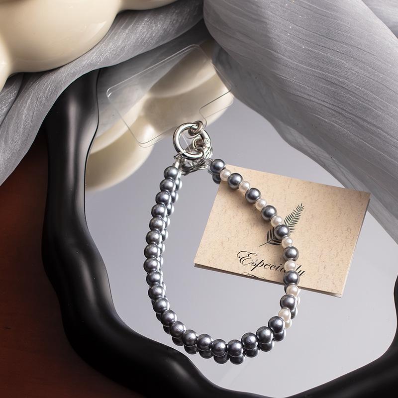 Жемчужный бант на запястье: Стиль Douyin, Защита от потери, Универсальная высококлассная цепочка из бусин для мобильных телефонов