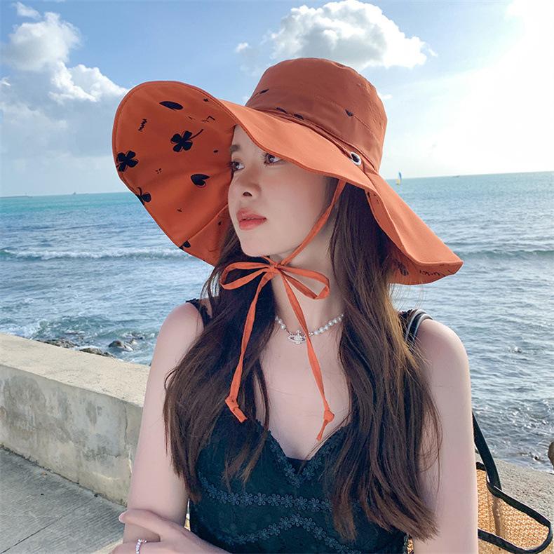 Summer seaside beach sun hat versatile outdoor big eaves bucket hat women's cotton and linen double-sided can wear four seasons sun protection hat