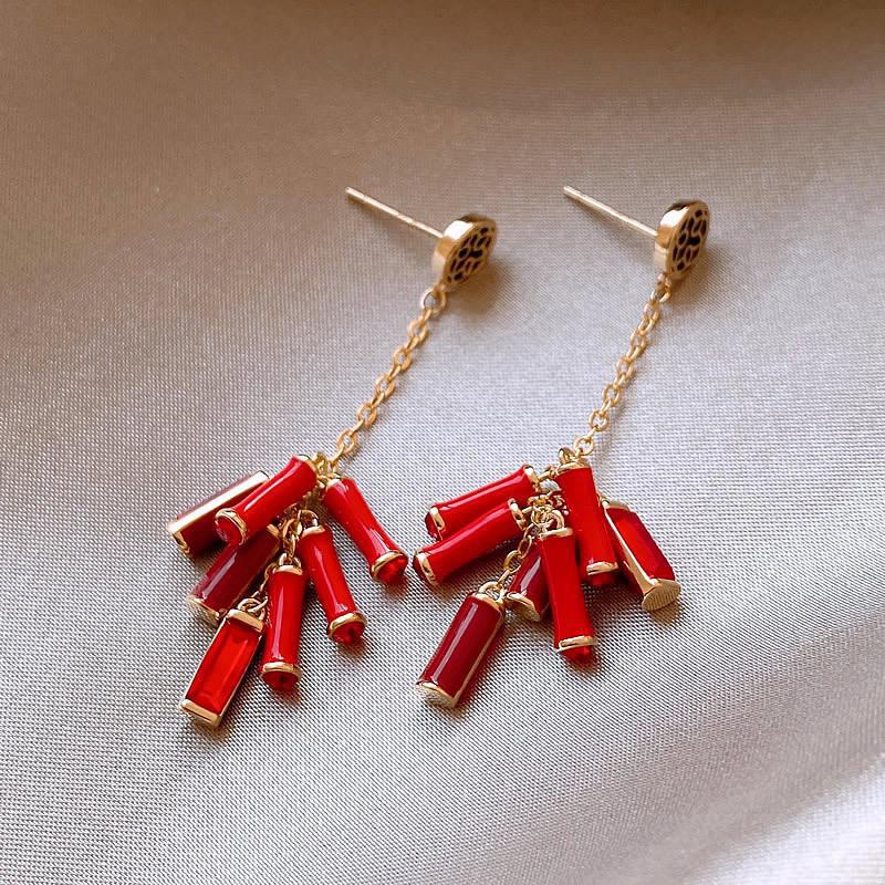 Серебряные серьги-иглы с кисточками "Fu": Праздничные и забавные аксессуары с искусной отделкой в виде капель масла и элементами петард для стильного образа.