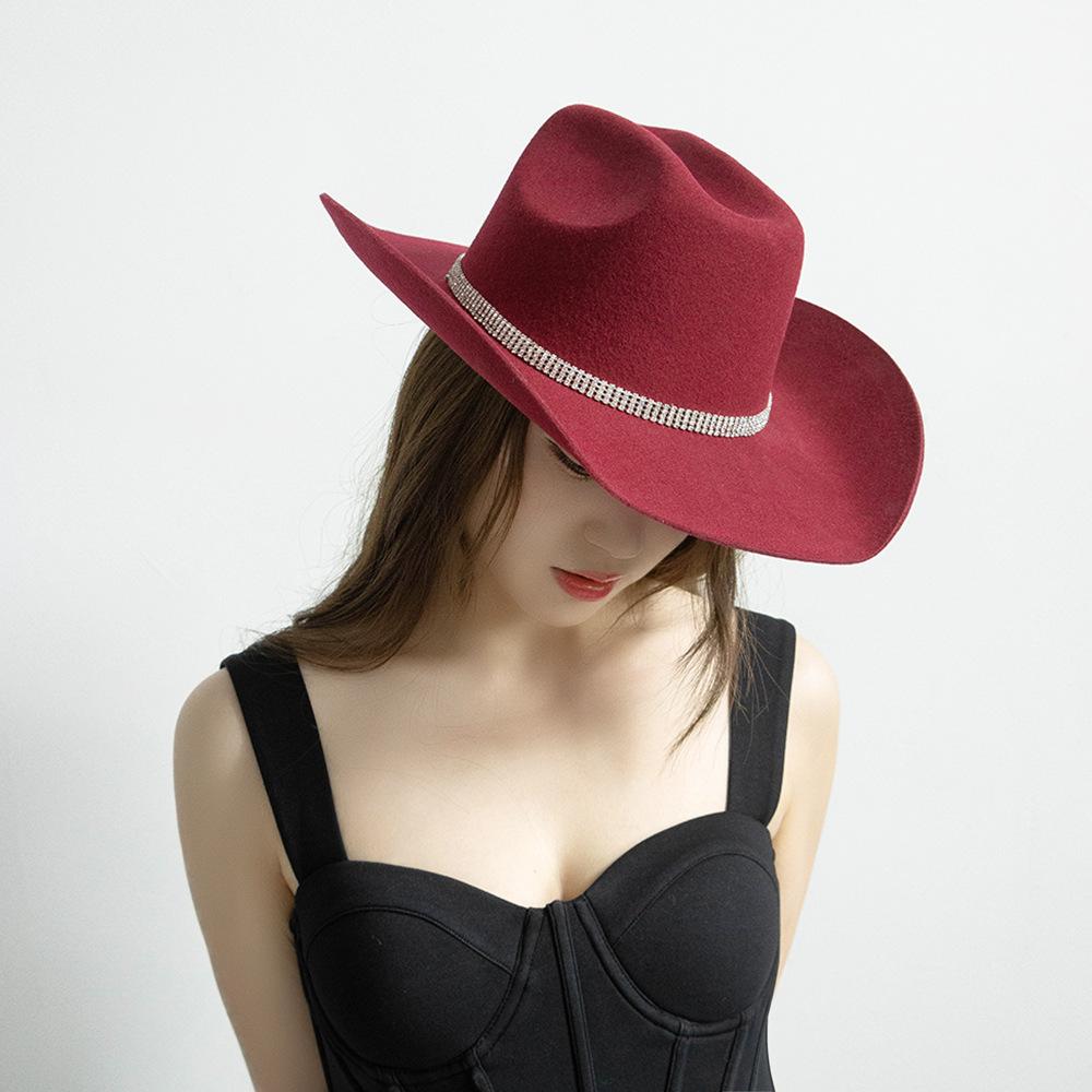 Europe, America autumn and winter fashion leisure hot-selling rhinestone metal feather big eaves warped edge wool cowboy hat felt hat tide