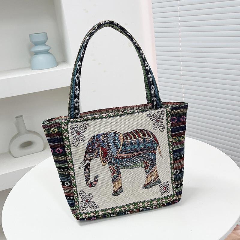 The Elephant Embroidery Double-sided Hand Shoulder Bag Is Versatile with Jacquard Patterns