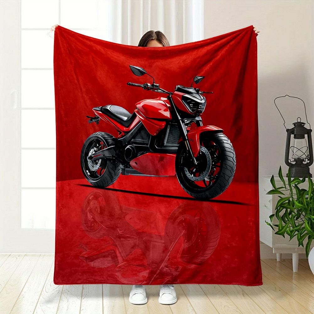 A red motorcycle with sleek design and reflection on a glossy surface. for all seasons blanket lunch break throw gift