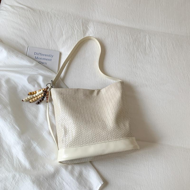Плетеная сумка женская трендовая сумка-ведро 2025 новая нишевая модная сумка подмышку ретро текстура на плечо сумка-мессенджер