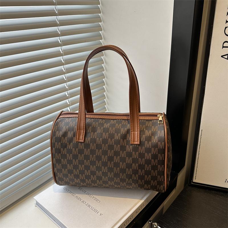 Новая универсальная сумка-тоут для通勤 в стиле ретро большой вместимости модная печать нишевая ручная сумка сумка-подушка