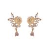 Ear clips without ear holes~ Camellia pearl stud earrings high-end sense niche gentle and sweet earrings women's mosquito coil disc earrings