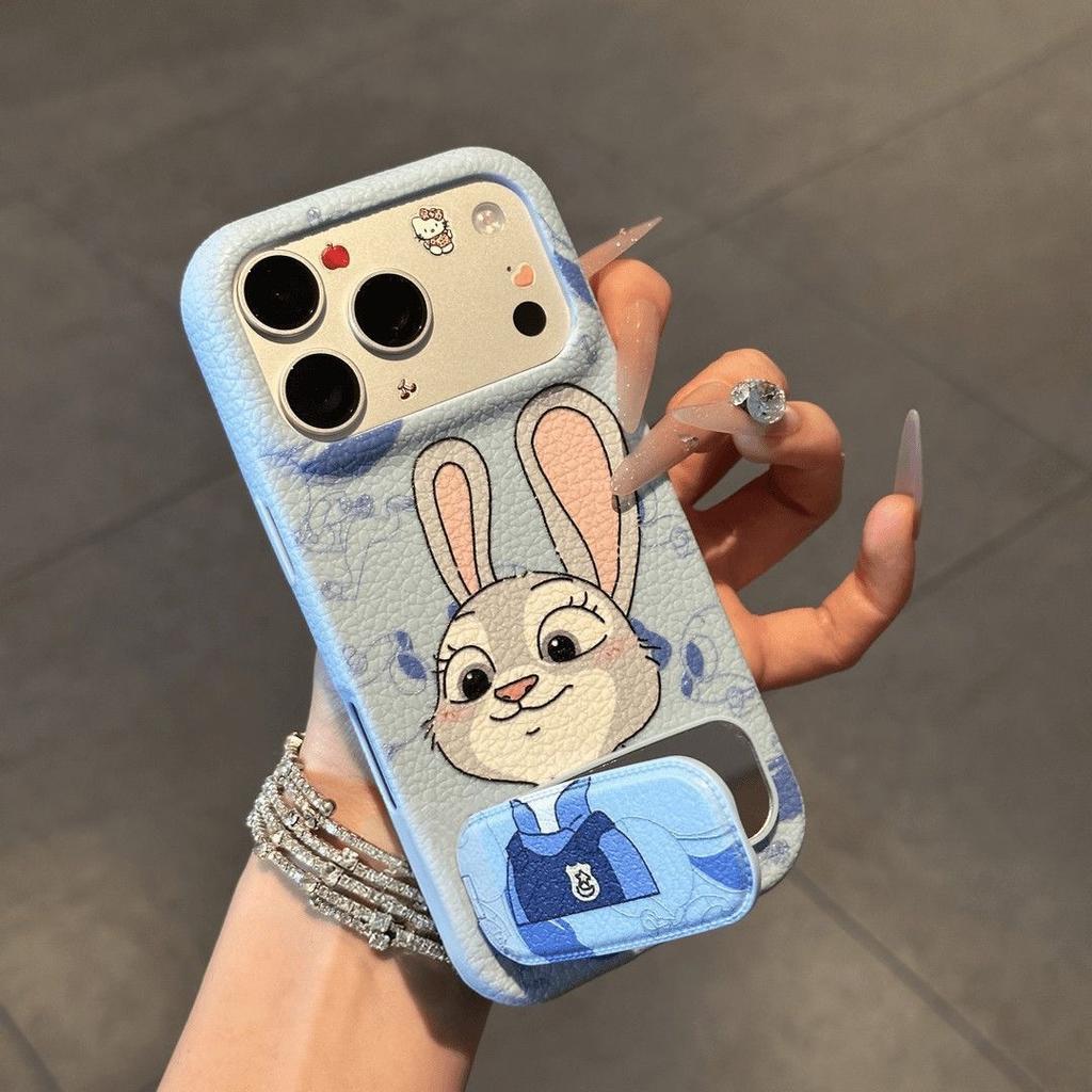 Применимый чехол для пары мобильных телефонов Apple 17PRO Judy Nick iPhone16 мультяшный кожаный узор чехол с зеркальным держателем