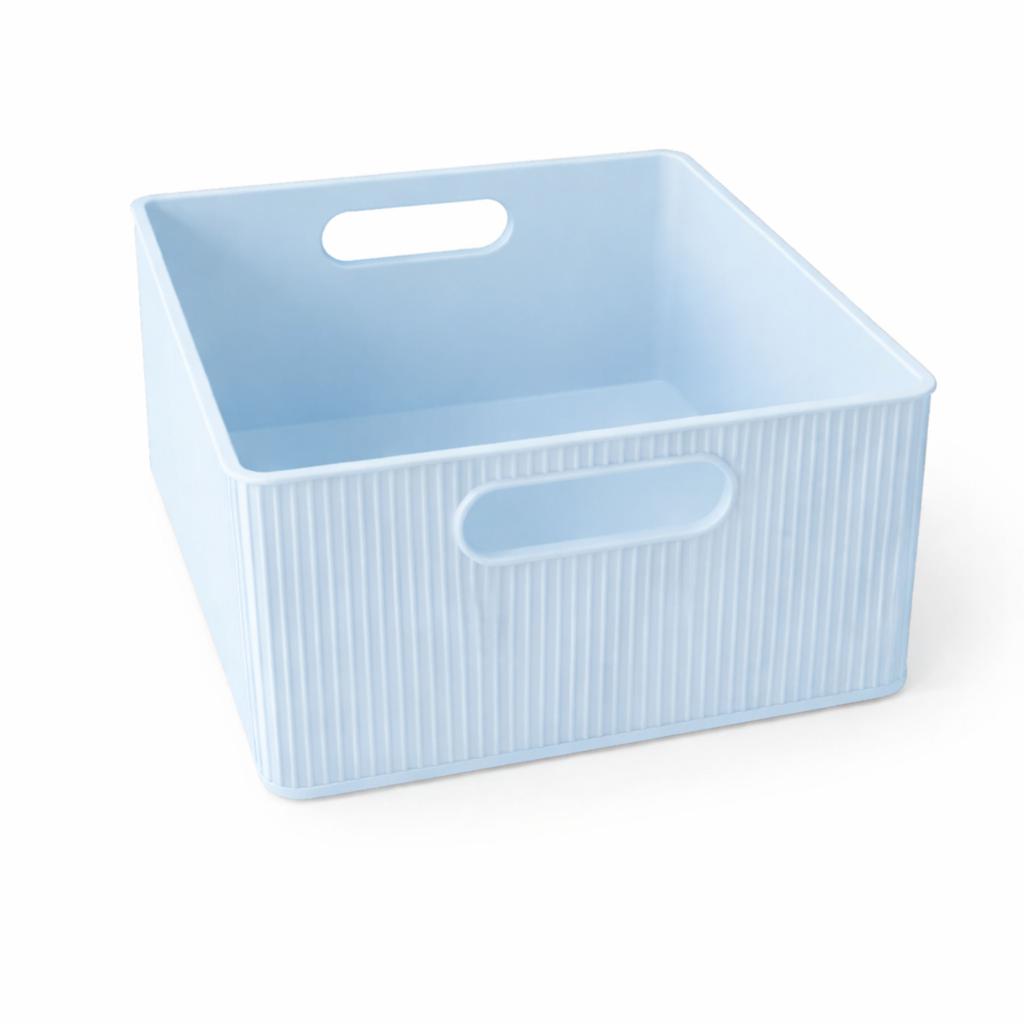 Blue organizer container with holders for small items, cables, office