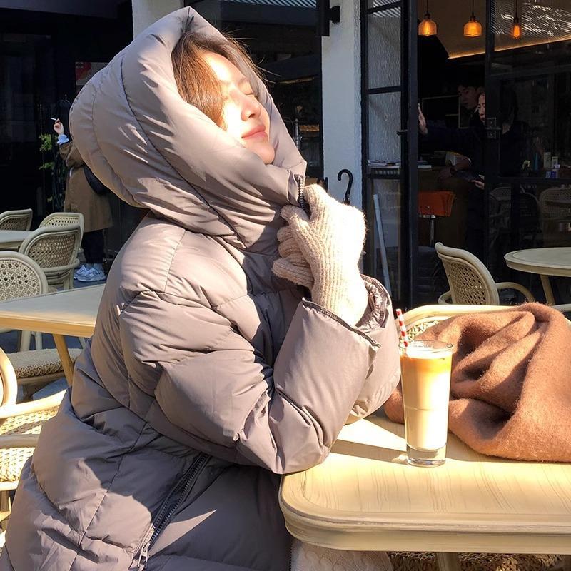 Интернет-знаменитость белая куртка-пуховик для женщин 2024 года, новое среднее и длинное свободное утолщенное зимнее пальто до колена