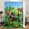 A cheerful mole bathes in a wooden tub among vibrant nature and insects. for all seasons blanket lunch break throw gift