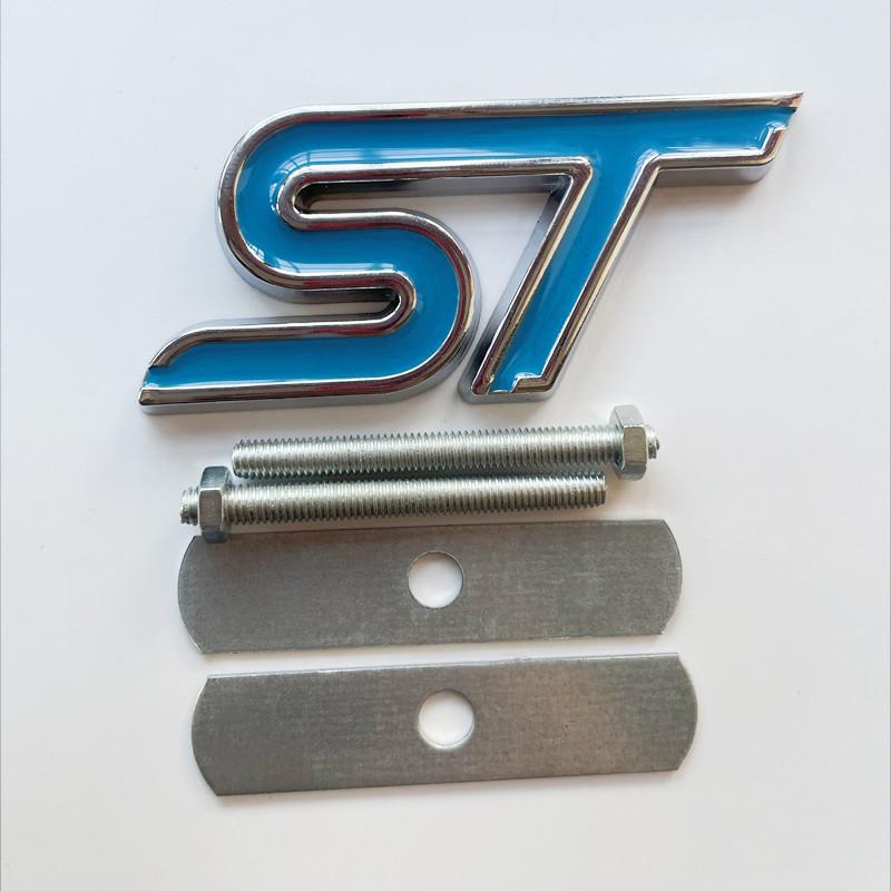 AJF1 3D Metal ST Front Grille Emblem Badge Car Rear Trunk Auto Sticker For Ford Focus Mondeo Fiesta Edge Escort MK2 MK3 MK4 MK5 MK7